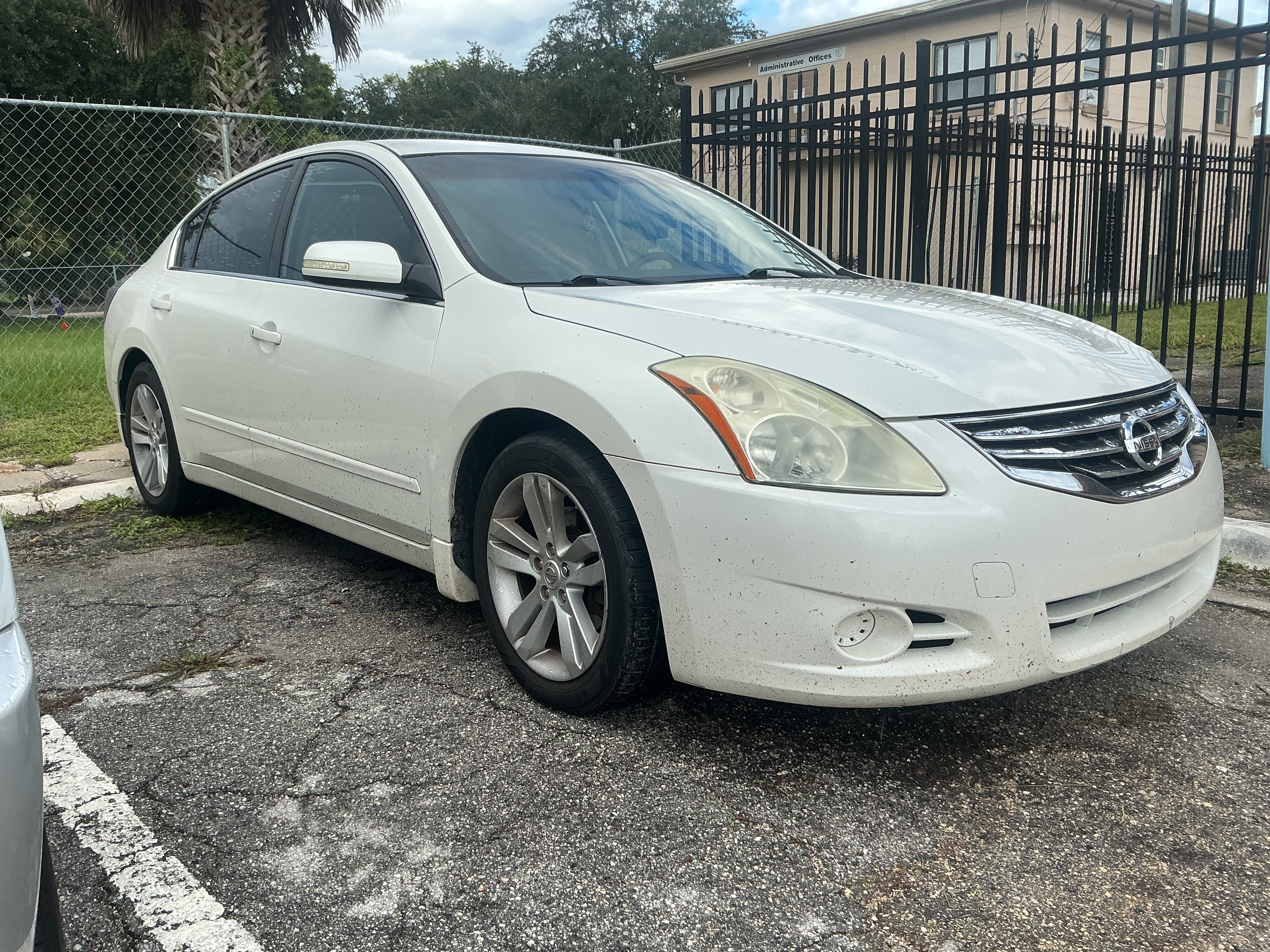 2011 white Nissan Altima — Front passenger-side exterior